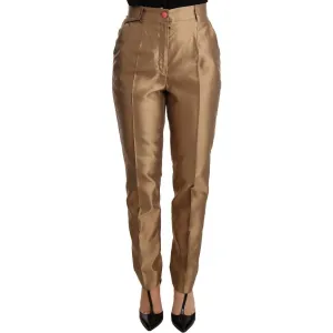 Dolce & Gabbana Elegant Tapered Silk Trousers in Gold